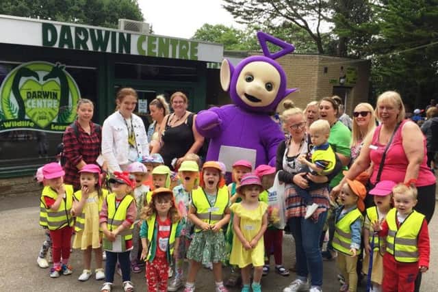 Tinky Winky, from children's TV show Teletubbies, cheered the children on during the Big Toddle at Blackpool Zoo