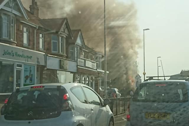 Smoke billowing from the takeaway, from which people were seen running (Picture by Alyssia Rothwell)