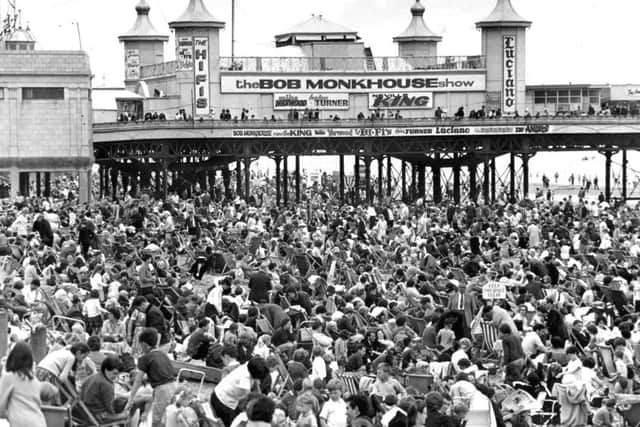 Thousands of beach lovers take to their deck chairs below Central Pier in 1965, when summer show headliners included Bob Monkhouse