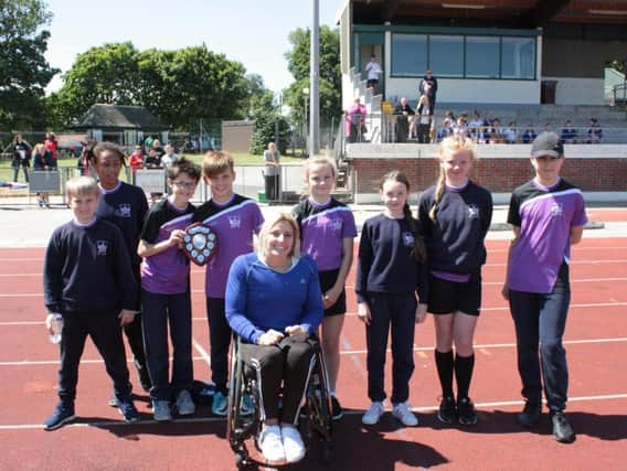 Thames Primary, winners of the large schools' athletics at the Blackpool Youth Games, with Paralympian Shelly Woods