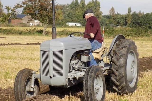 A Fergie tractor in action at a ploughing match in St Michaels
