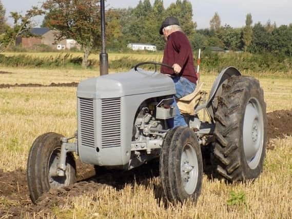 A Fergie tractor in action at a ploughing match in St Michaels