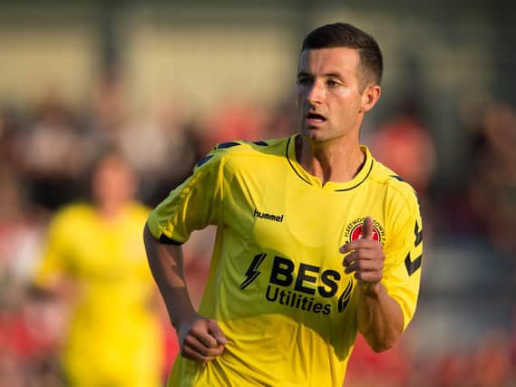 Jason Holt in action for Fleetwood Town at Salford City