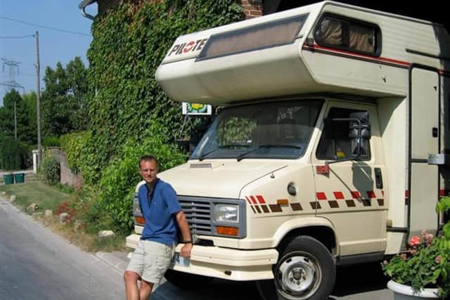 Tony and the camper van he lived in after leaving the UK