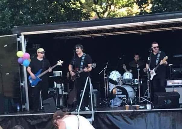 The Coustics on stage in Ashton Gardens, St Annes