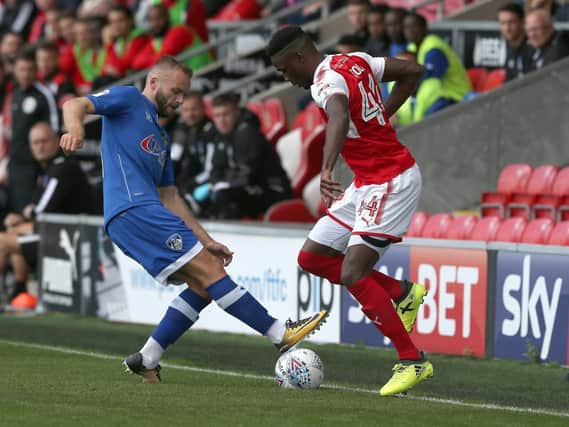McLaughlin in action for Oldham against Fleetwood Town last season