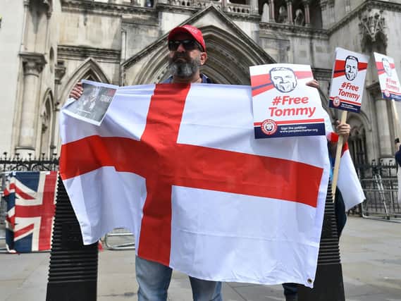 Supporters of former English Defence League (EDL) leader Tommy Robinson outside the Royal Courts of Justice, as he attempts to challenge his 13-month prison term for contempt of court. Photo credit: Kirsty O'Connor/PA Wire