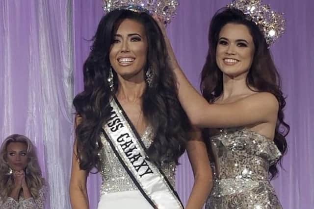 Joanna Johnson, left, crowned Miss Galaxy at the world competition in Orlando