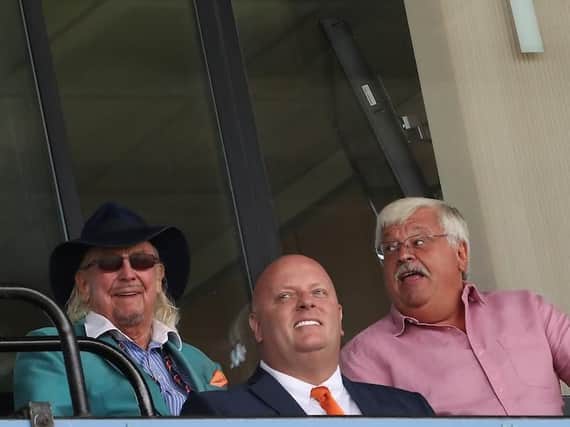 Owen Oyston sat in the directors' box with Jonathan Disley and Port Vale owner Norman Smurthwaite
