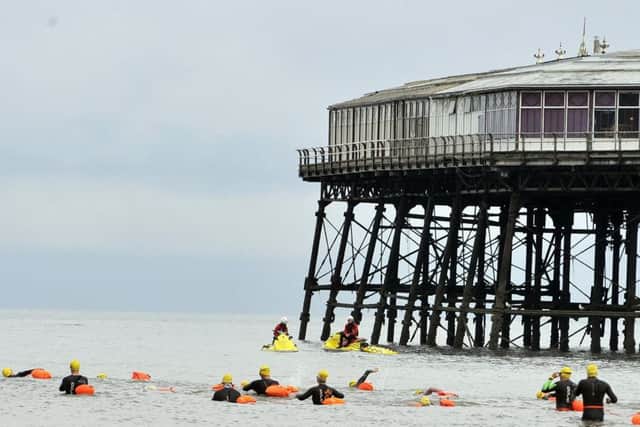 The swimmers set off from the North Pier to the South Pier