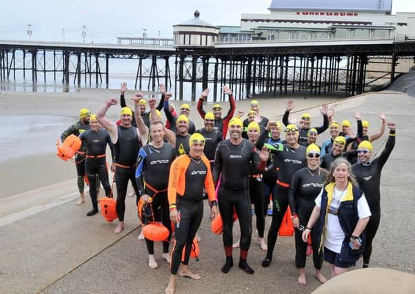The athletes prepare to swim from the North Pier to the South Pier