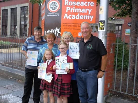 South shore community urges dog owners to clean up after their pets with a poster competition.

Left to right Brian Coope (Chairman, South Shore Community Partnership), 
Karen Coope, Izzy Donno Franklin, Holly Cutting, Karen Pennington, 
Gary Pennington (Chairman, Friends of Highfield Park)