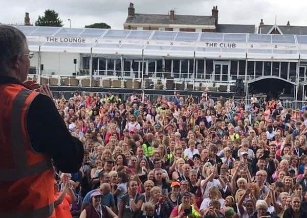 Thousands of people helped break a World Record - but not the one health bosses on the Fylde coast were originally aiming for. Just short of 1,700 people joined Dancing on Ice star Daniel Whiston to set the reocrd for most people performing jumping jacks simulataneously at Lytham Festival on Saturday morning. The Fylde Coast NHS was trying to break the record for the most people exercising to a fitness video in a single location, but that "unfortunately fell short."