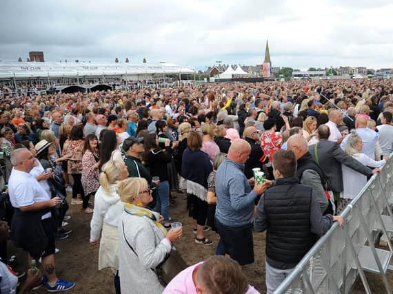 Music fans lined at Lytham Festival.