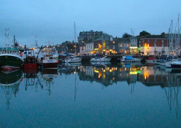 Padstow Harbour, on the North Cornwall coast, at dusk.