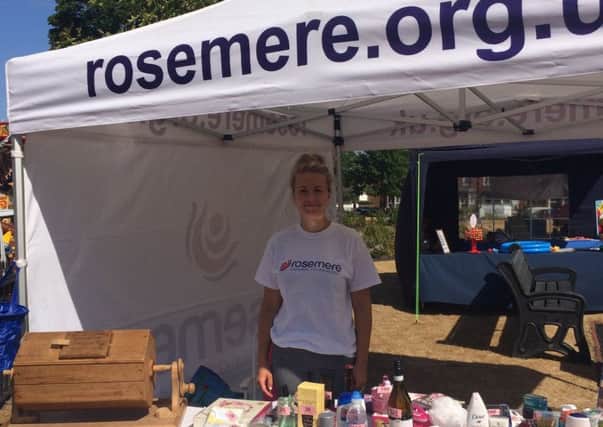 Rebecca Hall fundraised at Tram Sunday for the Rosemere Cancer Foundation.