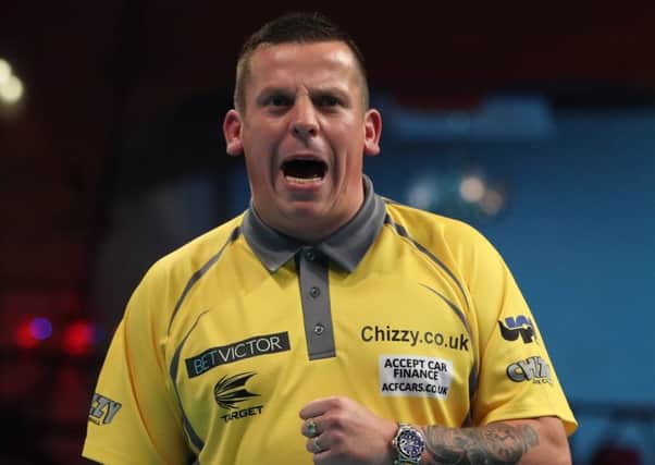 Dave Chisnall stormed back to defeat Michael Smith             Picture: Lawrence Lustig/PDC