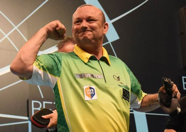 Darren Webster defeated world champion Rob Cross      Picture: Christopher Dean/PDC
