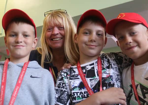 Susan Bennett with the four boys she is hosting at her home
Blackpool Link of Chernobyl Children's Lifeline has brought 10 youngsters, aged from 10 to 12, to the Fylde coast for a 28 day holiday
