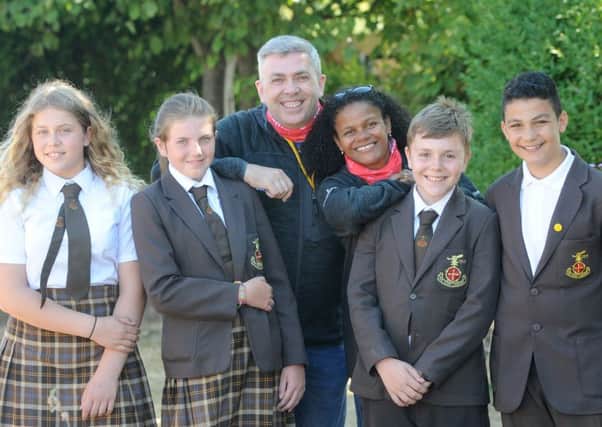 Andrew and Tracey Finlayson from charity BecomingX pay a visit to Baines.  They are pictured with pupils Brooke Hadgraft, Kaitlyn Gray, Mason Cannon and Eren Dervish.