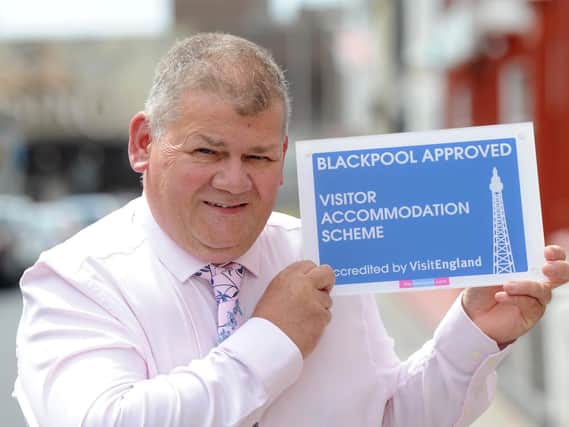 Ian White with his Blackpool Approved plaque