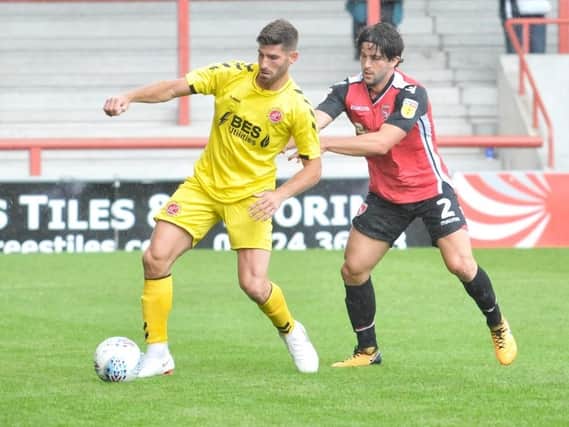 Fleetwood Town forward Ched Evans in action at Morecambe