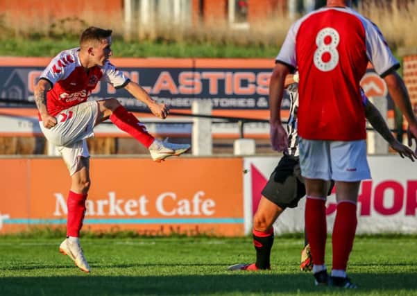 Ash Hunter in action for Fleetwood at Chorley. Photo credit FTFC