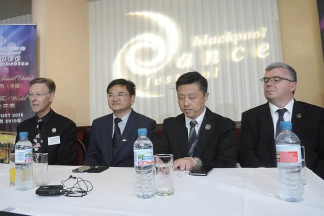 Launch of the Blackpool Dance Festival in China.  From left are Marcus Hilton MBE, Hiping Ge, Lao Bao and Michael Williams.