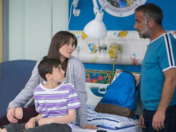 Kyran Bowes as Jack Webster, with Michael Le Vell and Brooke Vincent