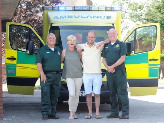 Emergency medical dispatcher Frank Cerra, Rachel and Robert Marsden and paramedic Geoff Hamriding.