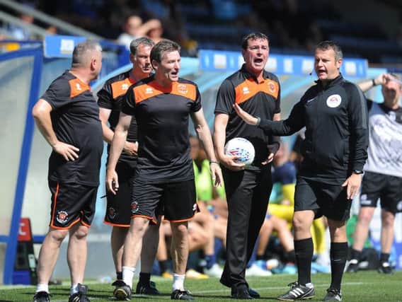 Gary Bowyer on the touchline at Adams Park