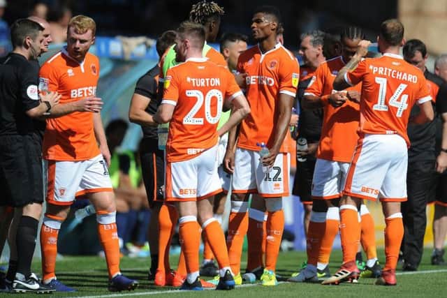 The Blackpool players take a well-earned water break