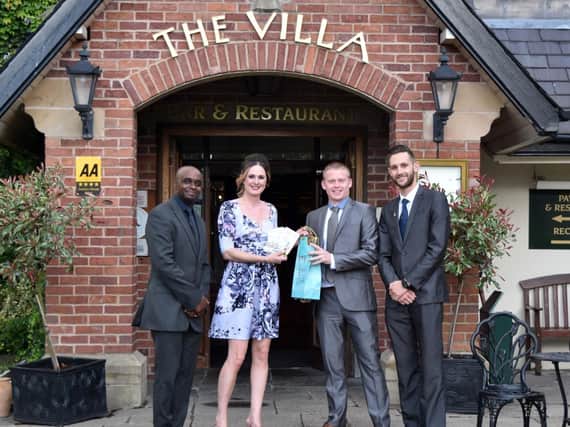 Jennifer Smith, from Preston, received her award from Jamie Baguley, owner of JOB Logistics Ltd. On the right is Managing Director of Intalinks, Tom Hilton who organised the competition with Jamie at Job Logistics, and John Rodgers, Marketing Executive at The Villa.