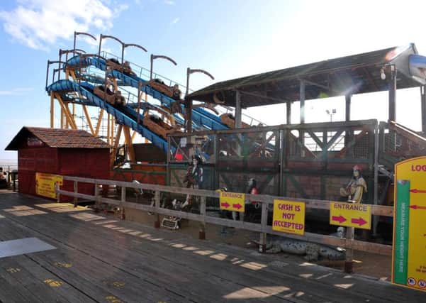 The log floom on the end of South Pier before it re-located to its current side adjacent to the pier.