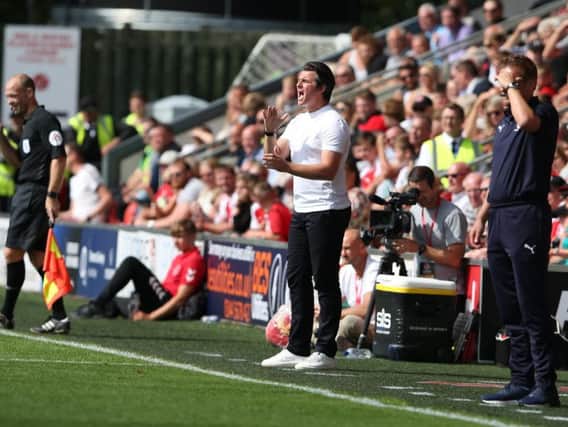 Joey Barton watches his first League One game as Fleetwood boss