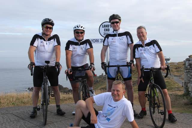 Andy Howe, Dave Scriven, Dave Docherty and Stuart Lawson who cycled from Land's End to John O'Groats, with driver Graham Reed