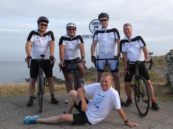 Andy Howe, Dave Scriven, Dave Docherty and Stuart Lawson who cycled from Land's End to John O'Groats, with driver Graham Reed