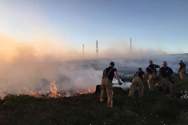 Firefighters tackle the Winter Hill wildfires