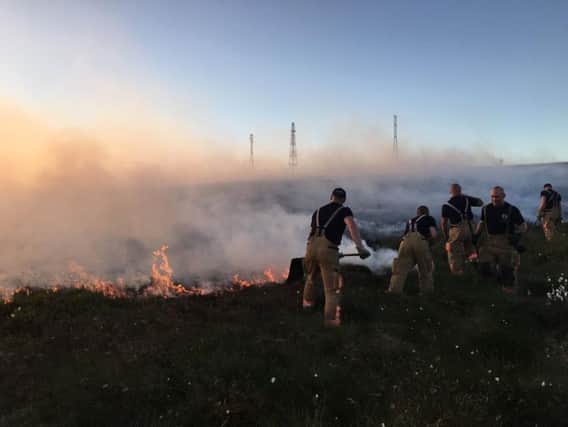 Firefighters tackle the Winter Hill wildfires