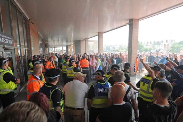 The day began with protests outside the ground