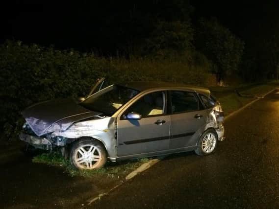 A man was arrested on suspicion of drink driving after a car ploughed through the wall of a property