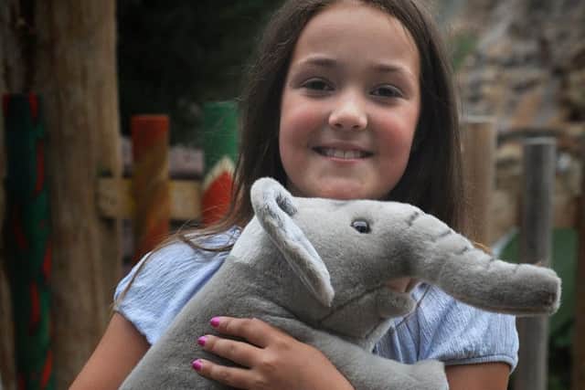 Blackpool Zoo held its annual Elefest, a celebration of all things elephant-related.
Ebony Dakin gives her toy elephant a cuddle.  PIC BY ROB LOCK
11-8-2018