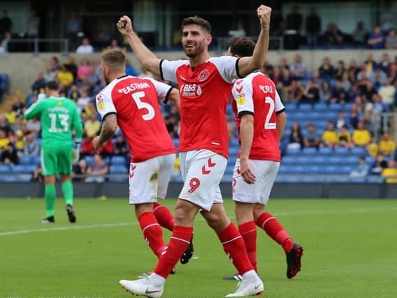 Ched Evans celebrates his first Fleetwood goal at Oxford