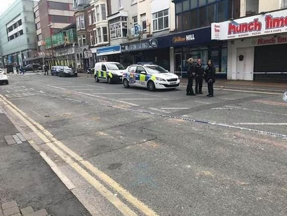 Police cordoned off a stretch of Talbot Road where a man was found bleeding from a severe head injury