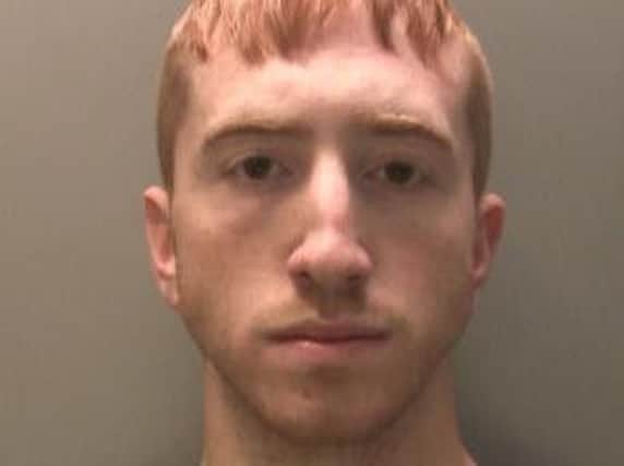 Austin Ross, 23, a far-right group supporter who has been jailed for six years after a month-long hate campaign which included spray painting landmarks with swastikas around his home town of Newport, south Wales. Photo credit: Gwent Police/PA Wire