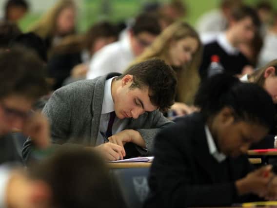 Teenagers sitting their GCSE exams