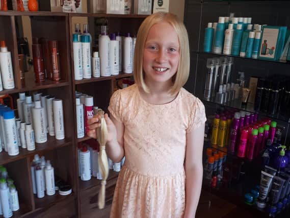 Charlotte Goodson had donated her hair to help children with cancer