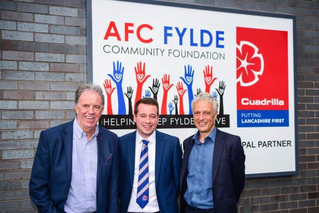 Mark Lawrenson, AFC Fylde director, Tom Hutton and Cuadrilla chief executive Francis Egan.