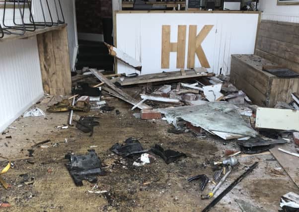 The mess left after a car crashed into the Health Kitchen in Fleetwood
