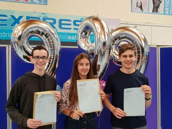 Three students at Lytham St Annes Technology and Performing Arts College celebrated a clean sweep of top grade nines in their GCSEs. From left: Matthew Hallewell, Holly Broan and James Frarrow